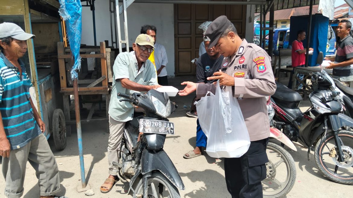 Jumat Berkah dan Cooling System Polsek Medang Deras Diwarnai Pemberian Nasi Bungkus