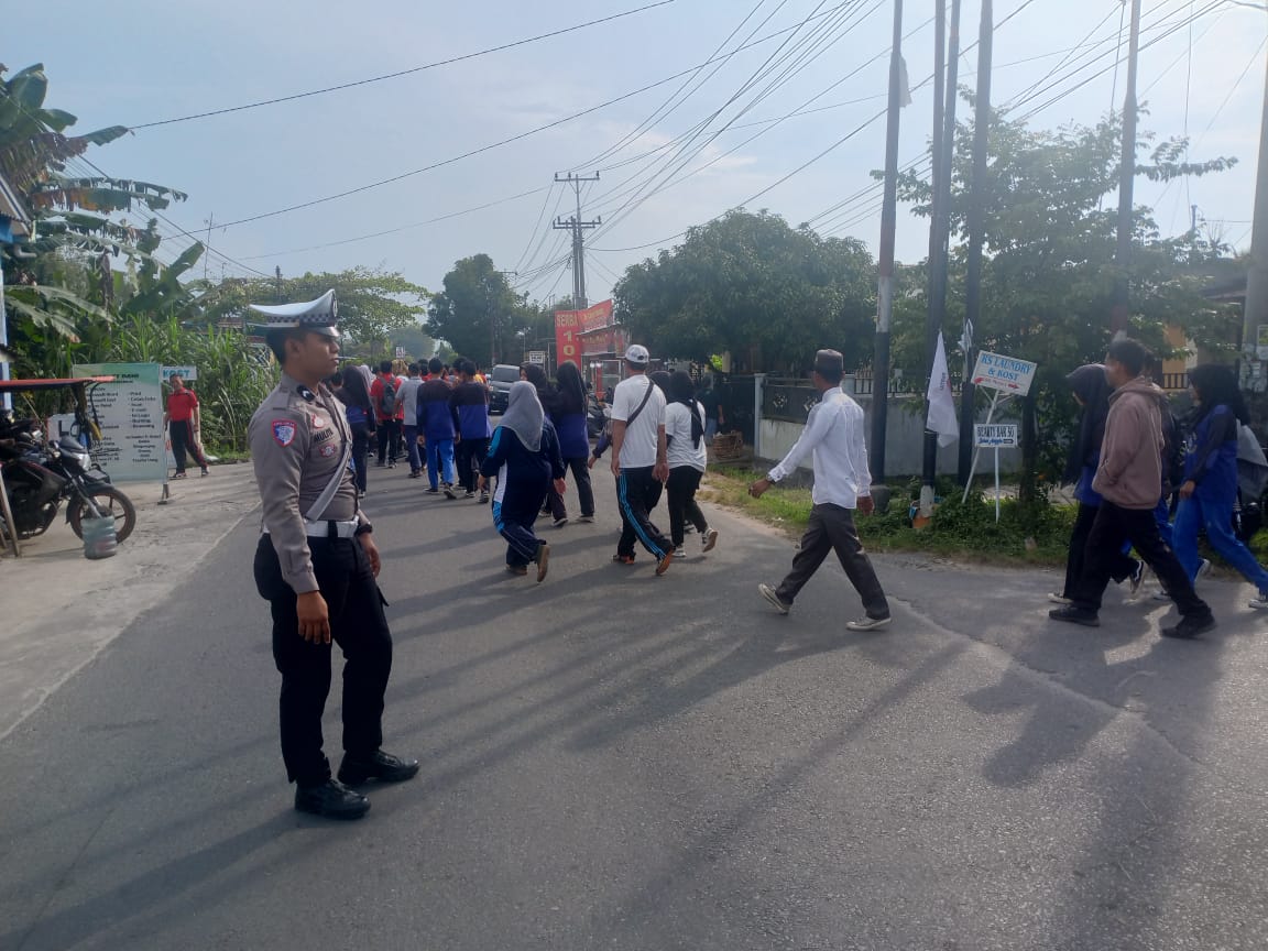 Satuan Lalu Lintas Polres Batubara, Laksanakan Pengamanan dan pengaturan jalan