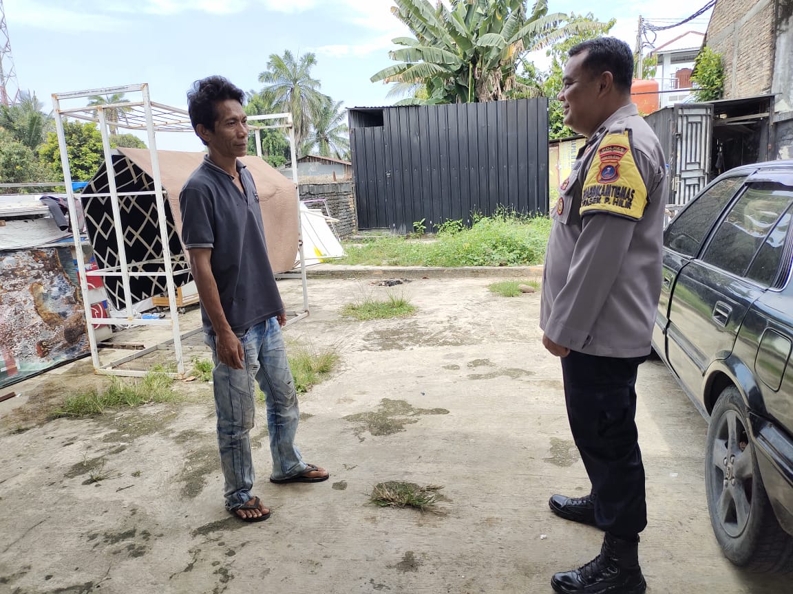 Bhabinkamtibmas Polsek Padang Hilir Sambangi Warga, Sampaikan Pesan Kamtibmas