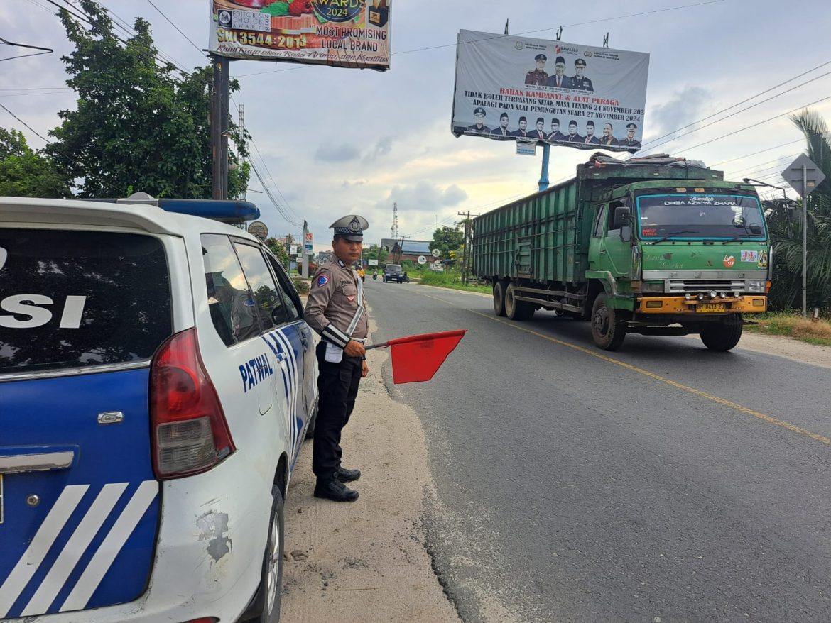 Sat Lantas Polres Batu Bara Patroli Kibas Bendera dan Live Report Arus Lalin di Jalinsum